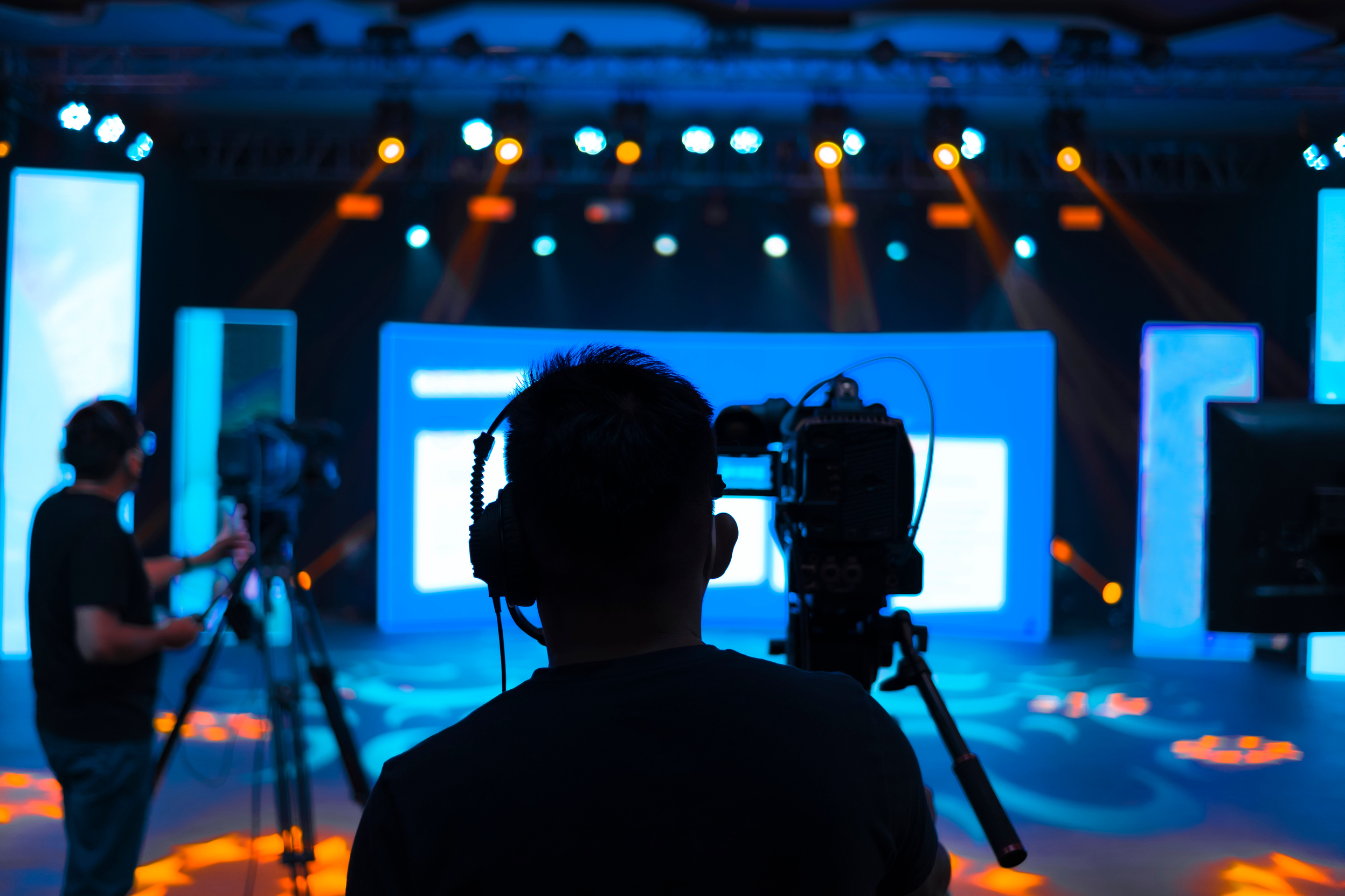 Professional Cameraman at a Filming Set 